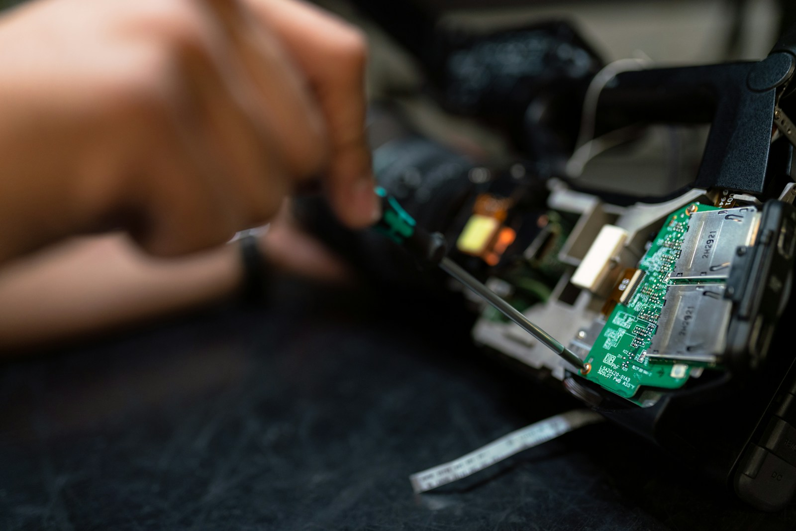 Precision work on electronic hardware at a bench